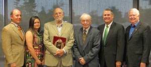 Honoring Dr. Sam Barnes with the annual Fred H. Roberson Award are, from left, Wes and Jessica Roberson; Barnes; Bill Roberson; Cookeville Regional Medical Center CEO Paul Korth; and Bob Bell, CRMC board of trustees vice chairman.