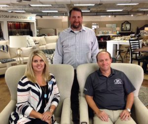 A handful of exhibitors have already signed on for the 2017 Home & Garden Show, including, from left, seated, Shannon Johnson, The Realty Firm; Jeremy Gunter, Hoover Paint; and, standing, Jacob Shaffield, Shaffield’s Furniture.